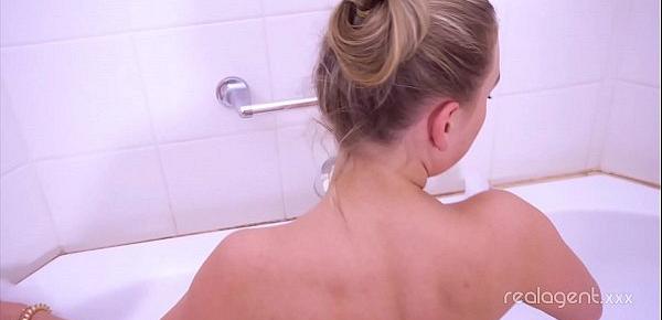  Hot blonde Daniella Margot fucks herself with a finger in the bath